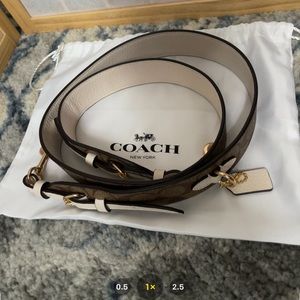 Coach Logo and White Purse Strap
